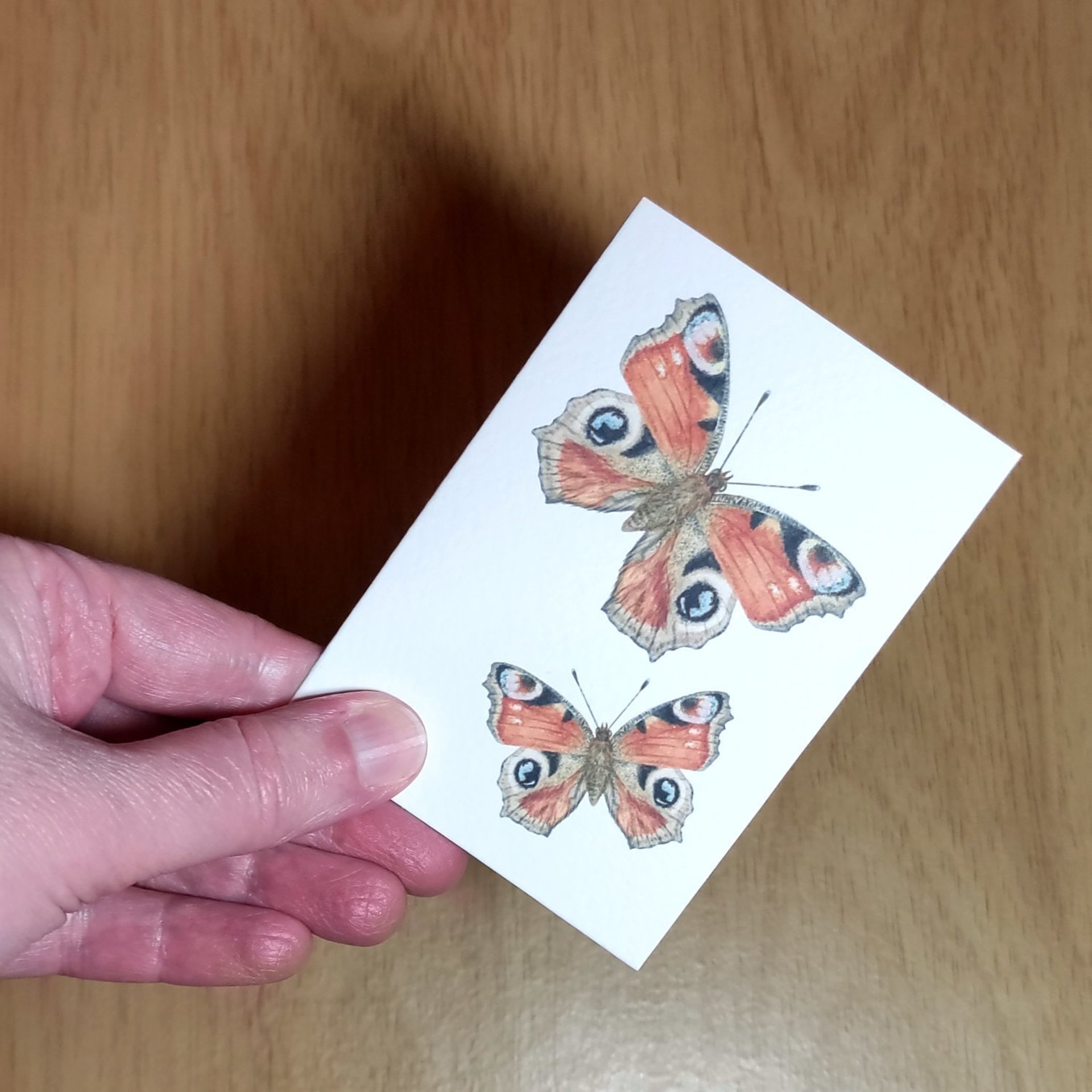 Butterflies mini note card held in a hand
