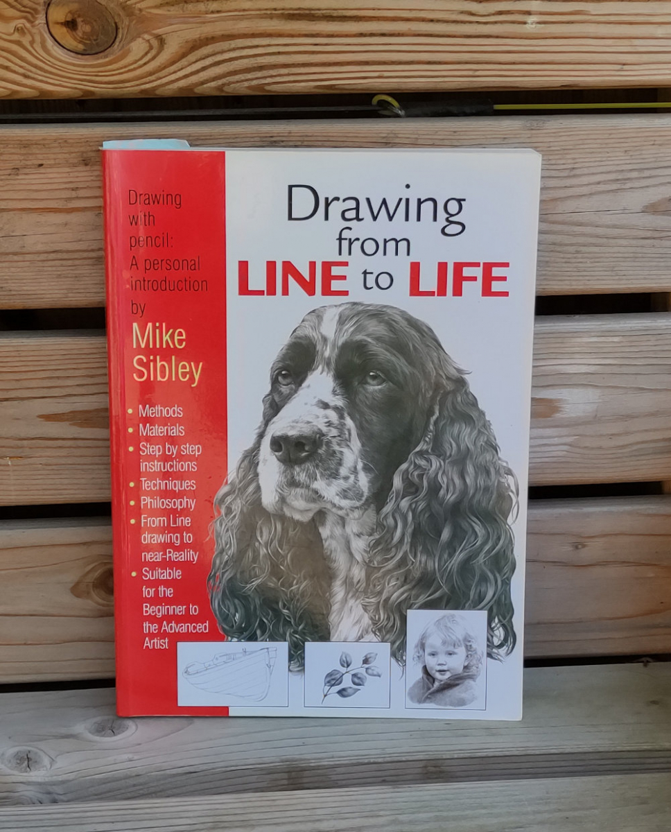 Drawing from Line to Life book lying on a seat