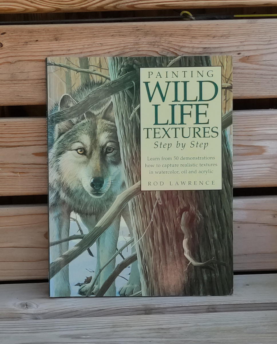 Painting Wildlife Textures Step-by-Step book lying on a seat